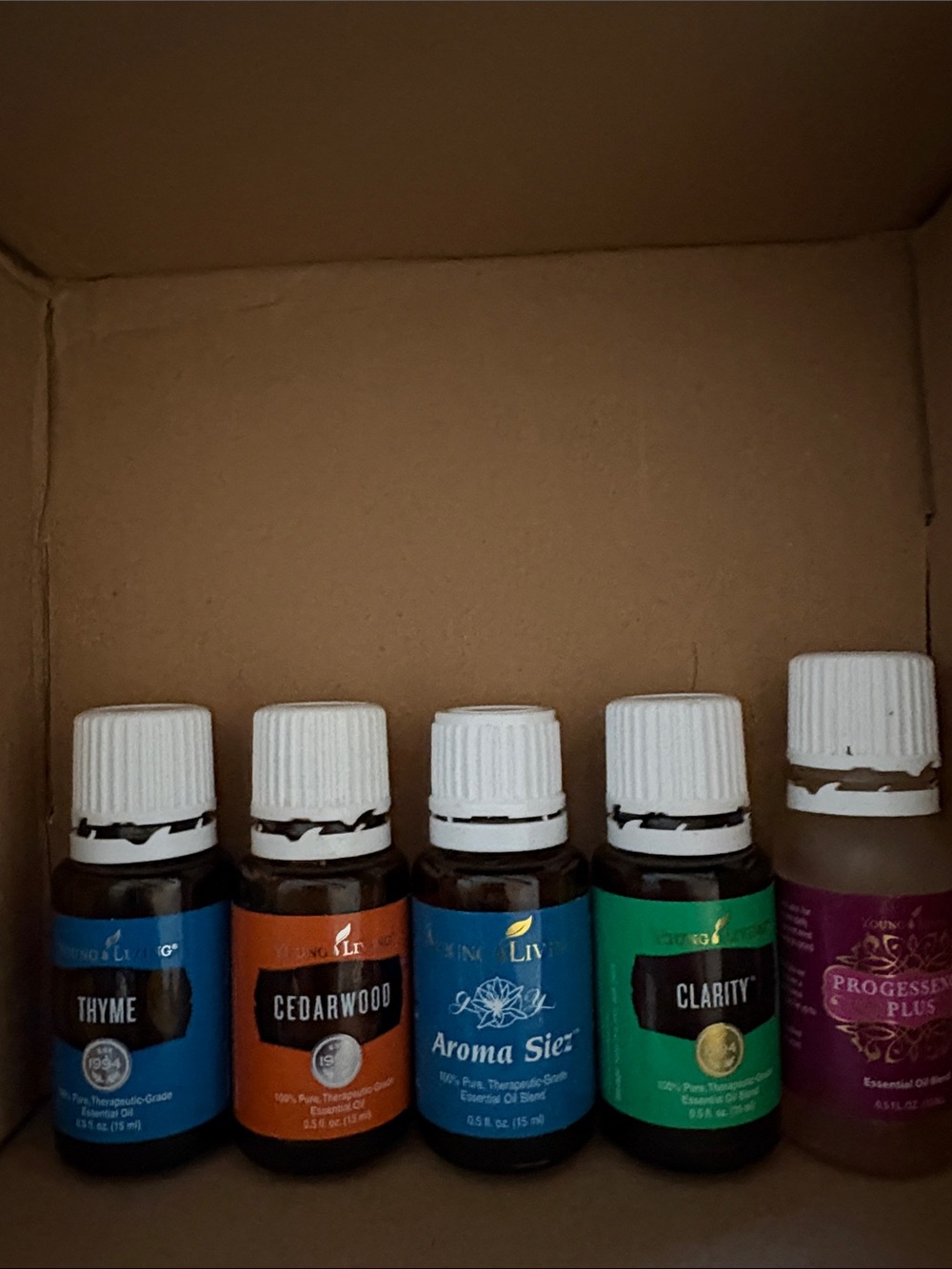 Young living opened bottles. Thyme, Cedarwood, Aroma Siez, progressence